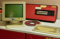 Still life shot of a countertop with an old keybaord and CRT monitor sitting unused.