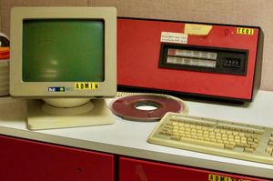 Still life shot of a countertop with an old keybaord and CRT monitor sitting unused.